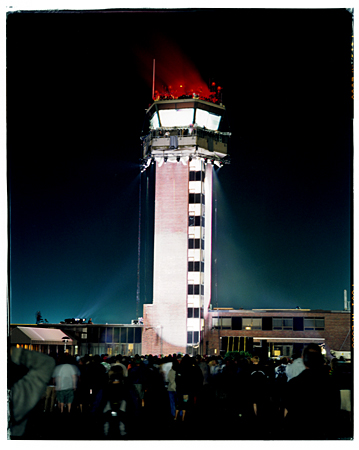 No, the control tower is not dormant at this moment.  Air traffic never sleeps.